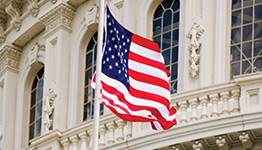 American flag in front of government building